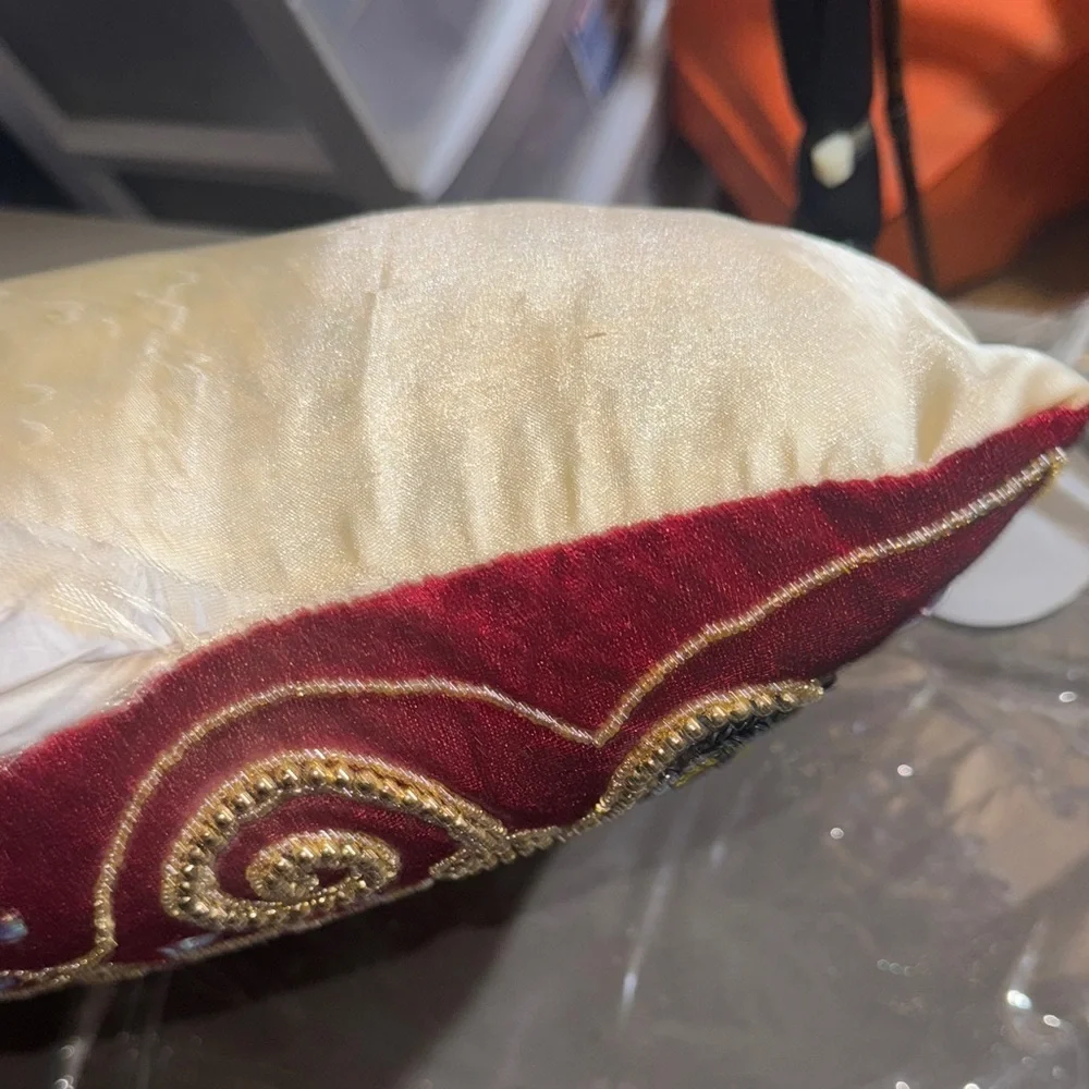 Elegant Red and White Embroidered Cushion